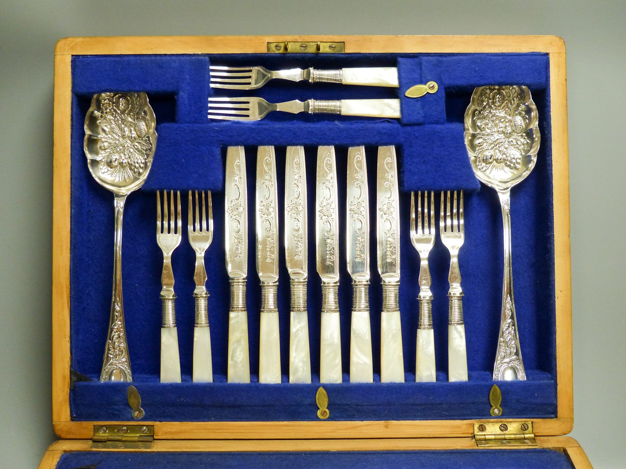 A mahogany cased silver plated dessert set